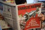 Plângere în justiţie împotriva revistei Charlie Hebdo după publicarea unei caricaturi despre incendiul de la Crans-Montana