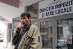 Românii care și-au plătit taxele în luna ianuarie vor primi și o acadea de la stat, s-o sugă